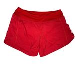 Lululemon Speed Up Short with a 4" inseam in Flamenco Red Swift Photo 3