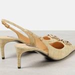 Dolce & Gabbana
Logo-embellished raffia slingback pumps Photo 8