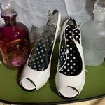 Colin Stuart  White Black Heels Photo 0