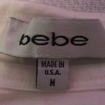 Bebe  EUC fitted short sleeve top Photo 3