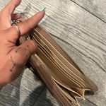 Guess  Cream/ Tan Handheld Clutch Wristlet Wallet Photo 1