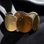 Kenneth Cole  tricolor hammered disc stretch bracelet Photo 0