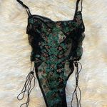 Black & Green Embroidered Bodysuit Photo 0