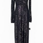 XScape  | Black Sequin Long Sleeve Surplus Evening Dress Gown. Photo 1