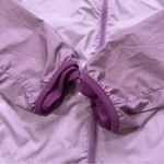 Nike Women’s Windbreaker Running Jacket Hooded Full Zip Lightweight in Purple L Photo 5
