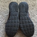 Nike  Women's Tanjun Sneakers size 12 Photo 3