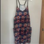 FP Movement by Free People Hot Shot Romper in Black Daisy Combo Sz L EUC Size L Photo 5