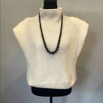 Cream Sleeveless retro looks Sweater White Size M Photo 0