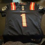 Nike NFL players women’s medium N.E Patriots Cam Newton jersey. Photo 0