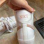 Nike  blazer sneakers girls size 5.5. Only wore once minor, flaw besides that in perfect condition. Color:light pink/white  Photo 2
