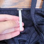 Free People • Royalty Peplum Top black quilted jacquard knit strappy tank cutout Photo 3