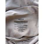 SKIMS  Seamless Sculpt Strapless Thong Bodysuit Sienna  
Size Medium Photo 6