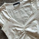 Brandy Melville V Neck Cinched Short Sleeve Top Photo 2