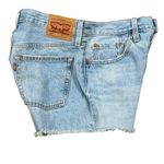 Vintage Levi's 501 light wash distressed jeans. Waist 27 (2" inseam) Photo 3