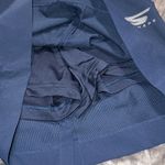 Skechers  performance go golf skorts size 4 button zip closure with pockets Photo 3