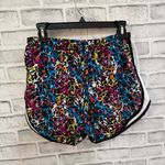 Nike Women’s Dri-fit multi color funky dot colorway lined athletic shorts large Photo 1