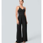 Halara NWT  backless zipper pocket wide leg quick dry resort slip jumpsuit medium Photo 1