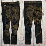 Lole  Burst Black and Gold Print Ankle Leggings. Size Small. EUC Photo 2