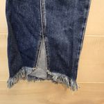 {29} KanCan Distressed Blue Jean Split Flare Hem Fringe Detail Photo 5