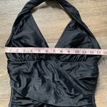 Jaclyn Smith Elegant Black Halter Swimsuit Photo 2