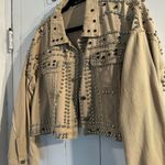 Akira  Tan Jean Fabric with Silver and Black Accent Studs embellished all over. Photo 2