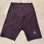 Peloton Women's Purple bike Shorts cadent cross front 7” Small Photo 3