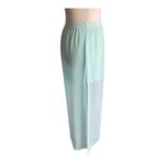Divided H&M -MAXI SKIRT-SIZE 4 Gorgeous mint green skirt, mini skirt with a sheer maxi overlay, elastic waist, slits on both sides of the skirt, excellent condition Measurements: Waist: side to side 13-17 inches Length: mini skirt Waistband to bottom 13 inches Length: overlay skirt Waistband to bottom 41 1/2 inches Photo 6