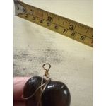 Handmade Pendant Wrapped In Gold Colored Wire Photo 1