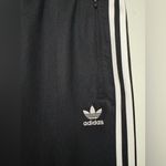 Adidas  unisex Black Joggers with White Stripes Photo 2