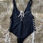 Aila Blue Swimmer with lace up Black One piece Size S Photo 0