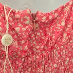 WAYF Floral Dress Size S  New Reg $90.  The dress features a dainty floral print and a fitted waist that is so flattering and fun to wear.   Fit: Fitted at waist  Closure: back zipper 100% rayon, polyester Photo 5