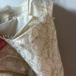 Jenny Yoo Collection Lace Mini Dress in white/gold in size 12. Photo 6