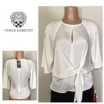 Vince Camuto New. ivory blouse bar top. Retails $89. Size XS. runs a little big. Photo 1