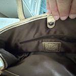 Coach Like New WOMENS  authentic leather gold signature handbag with 4 interior pockets  Photo 5