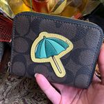 Coach Authentic Signature canvas/leather umbrella zip around wallet Photo 1