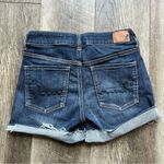 American Eagle  Midi Dark Blue Denim Super Stretch Shorts Cuff Raw Hem Size 4 Photo 3