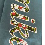 Nike Women’s Sportswear Femme Floral Logo 7/8 Teal Leggings Photo 2