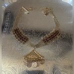 Anthropologie  Elegant Gold and Brown Necklace Photo 1