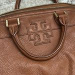 Tory Burch  brown purse with signature logo Photo 1