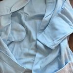 Women's bathrobe is one size, light blue, and is from the Seven Apparel brand. Blue Photo 4