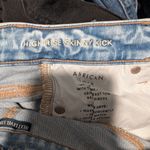 American Eagle Kickboot Light Wash Raw Hem- Size 2 Photo 3