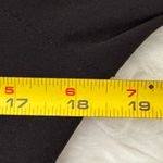 Kirkland Signature Elegant Black Floral Hem top with cold‎ shoulder embroidered flower shape cutout Photo 7