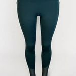 Senita Athletics green leggings size Small mesh details with pockets Photo 0