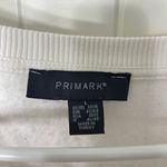 Primark EUC women’s white colored sleeve fleece lined decal crewneck large Photo 3