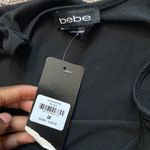 Bebe  Romper SIZE M Photo 2