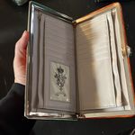 Nicole Lee new wallet in orange vegan leather. Photo 1