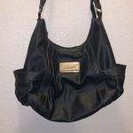 Jaclyn Smith  black twisted strap shoulder bag Photo 1