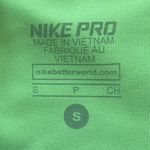 Nike Pro Women’s 3” Shorts Sz S in Bright Green/Black Polka Dot Photo 2