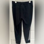 Adidas  woman’s medium joggers Photo 1