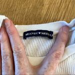 Brandy Melville  Raw Hem Short Sleeve Tee in White Photo 2